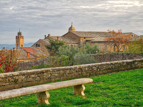 Eggers, Julie 아티스트의 Italy-Tuscany-Province of Siena-Montalcino Stone bench overlooking the town of Montalcino작품입니다.